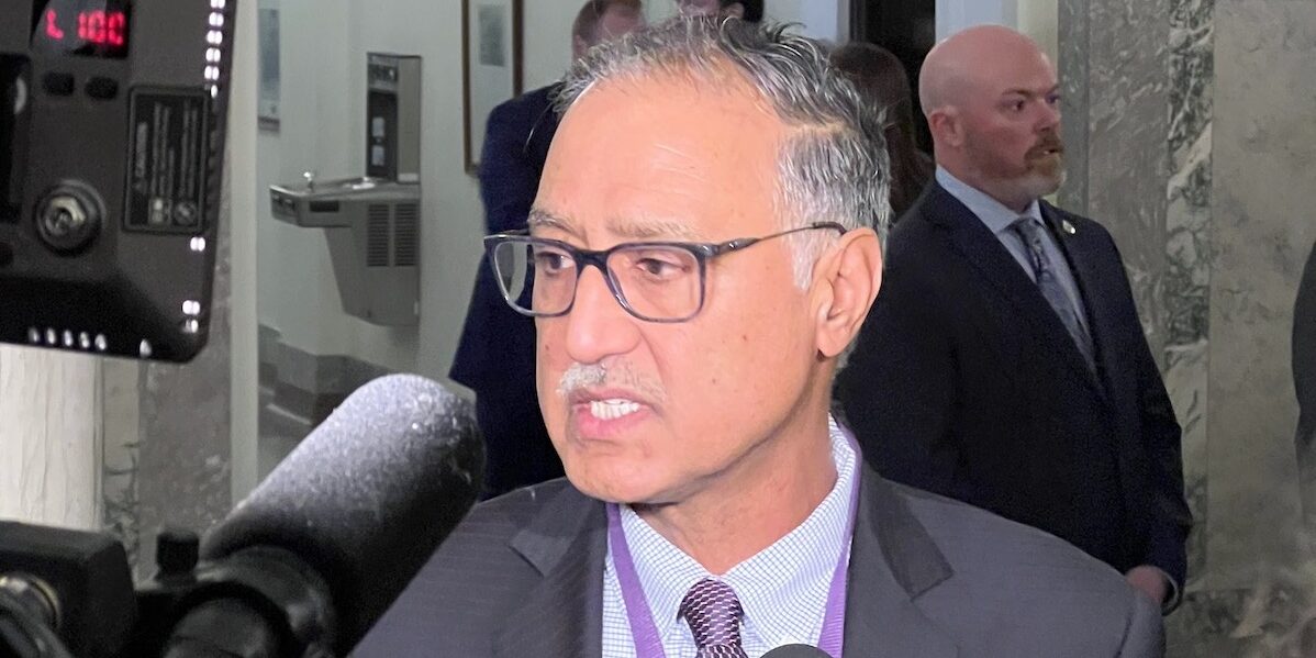 Edmonton Mayor Amarjeet Sohi encounters reporters during a recent visit to the Alberta Legislature.