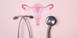 The image of a uterus and a stethoscope.