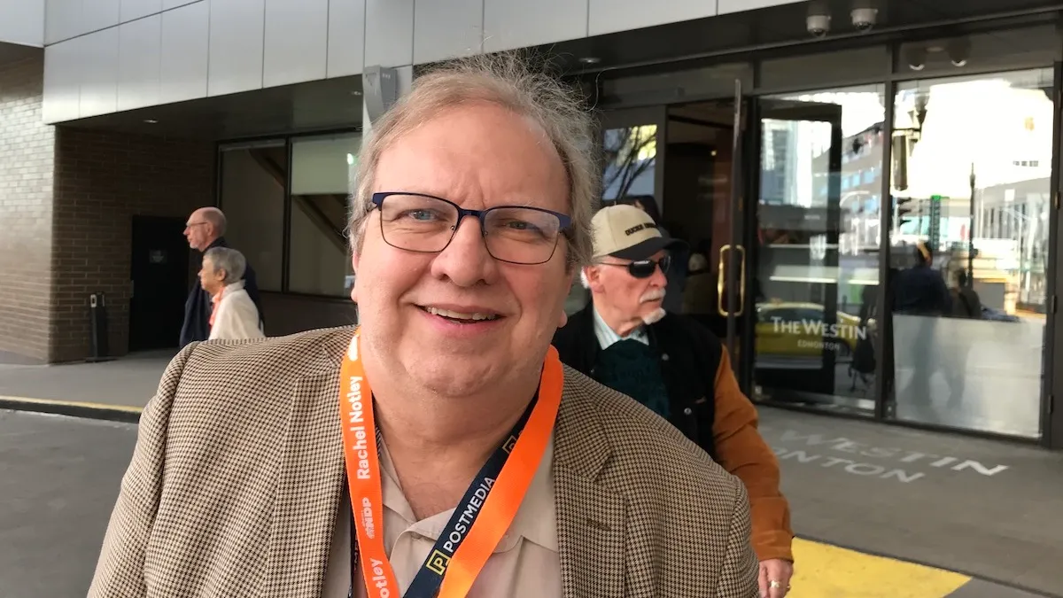 Calgary Sun political columnist Rick Bell, hatless at the NDP annual convention in 2019.