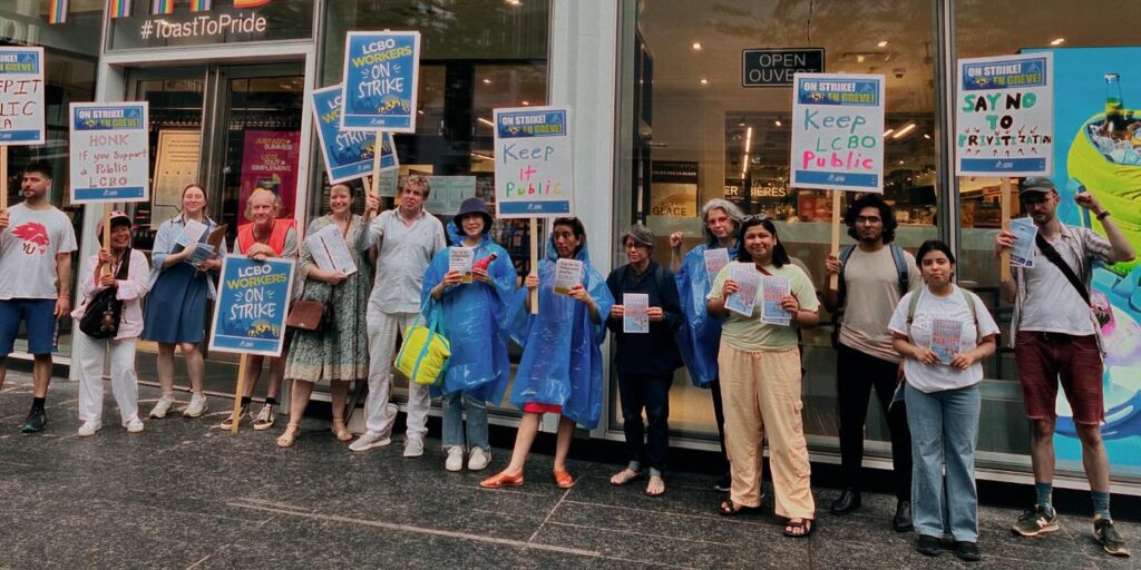 Striking LCBO workers picket outside of a Toronto location.