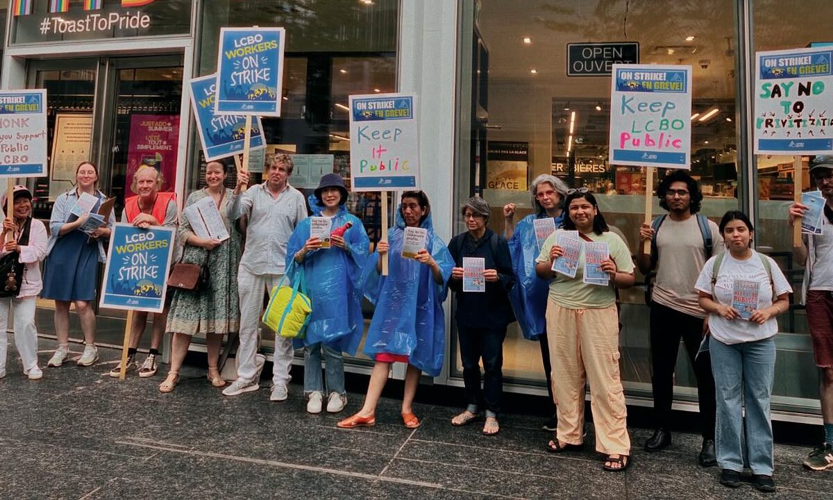 Striking LCBO workers picket outside of a Toronto location.