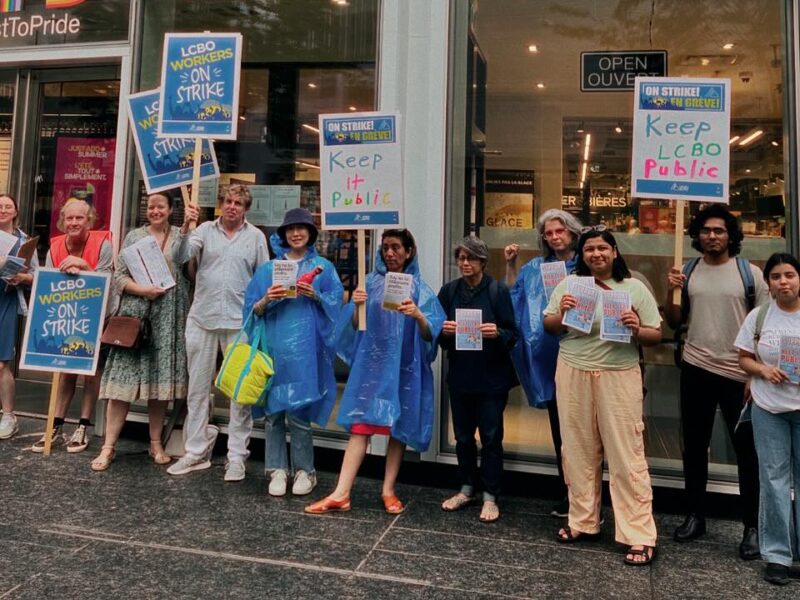 Striking LCBO workers picket outside of a Toronto location.