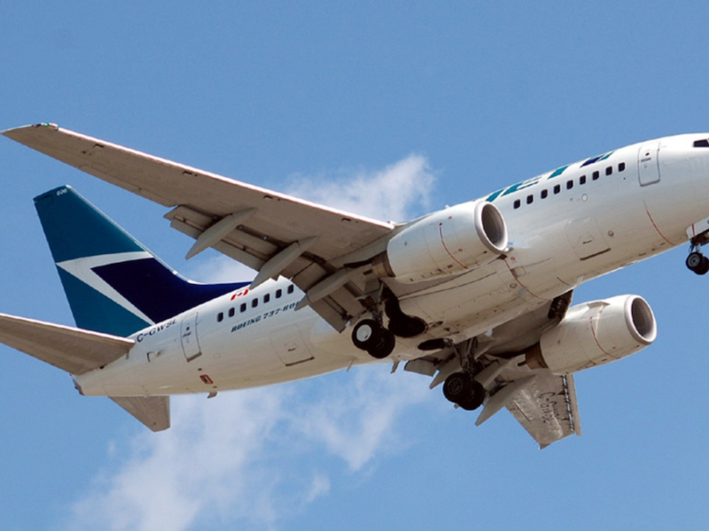 A WestJet aircraft in flight.