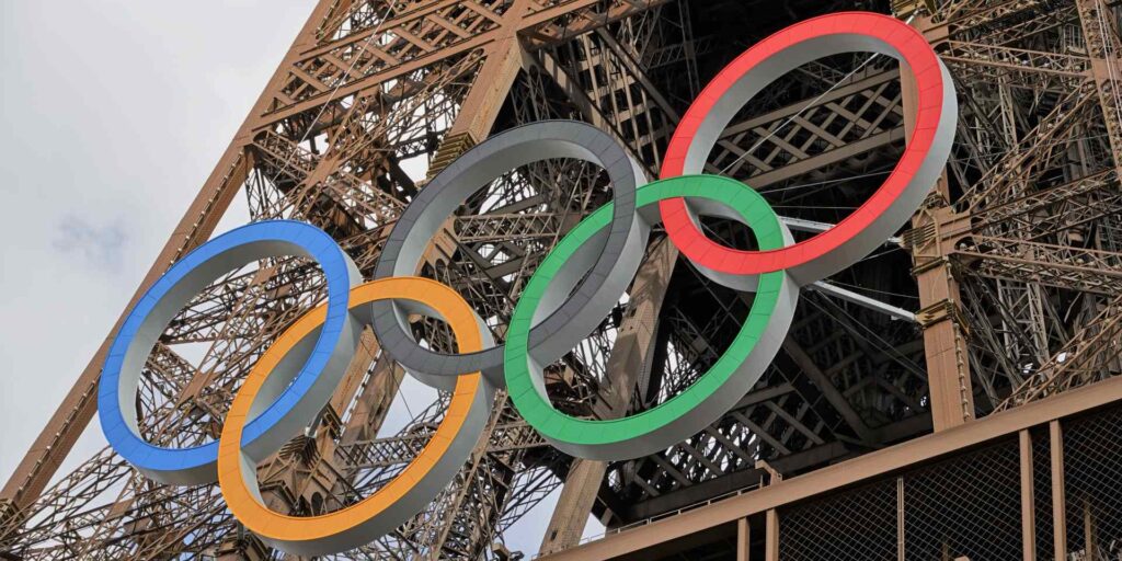 The Olympic rings on the Eiffel Tower.