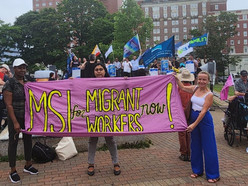 Kerian Burnett, Stacey Gomez, Executive Director of the Centre for Migrant Worker Rights Nova Scotia and Tracy Glynn, National Director of Projects and Operations of the Canadian Health Coalition, at a rally for public health care outside the premiers’ meeting in Halifax on July 16, 2024.