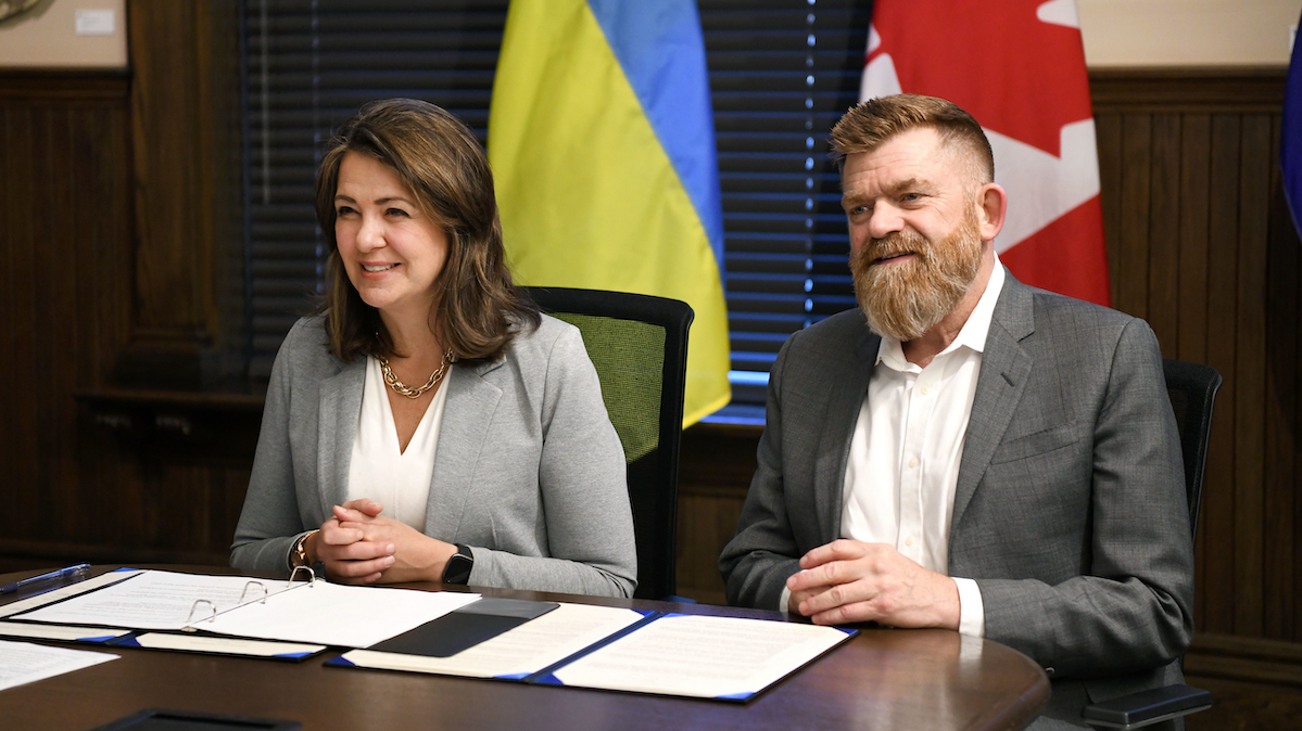 Premier Danielle Smith and Energy Minister Brian Jean last spring.