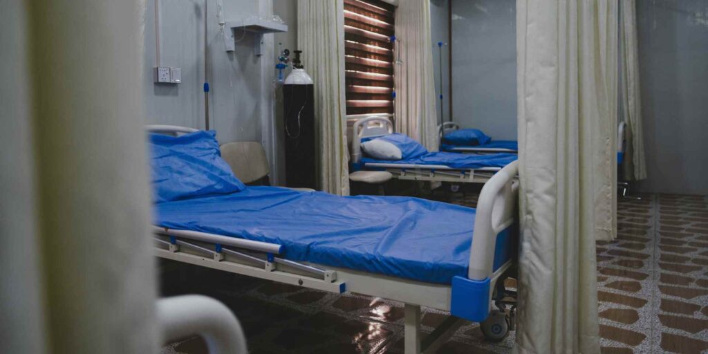 Beds in a hospital emergency room.