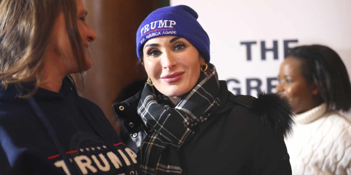 A photo of Laura Loomer wearing a Trump campaign hate from January of this year.