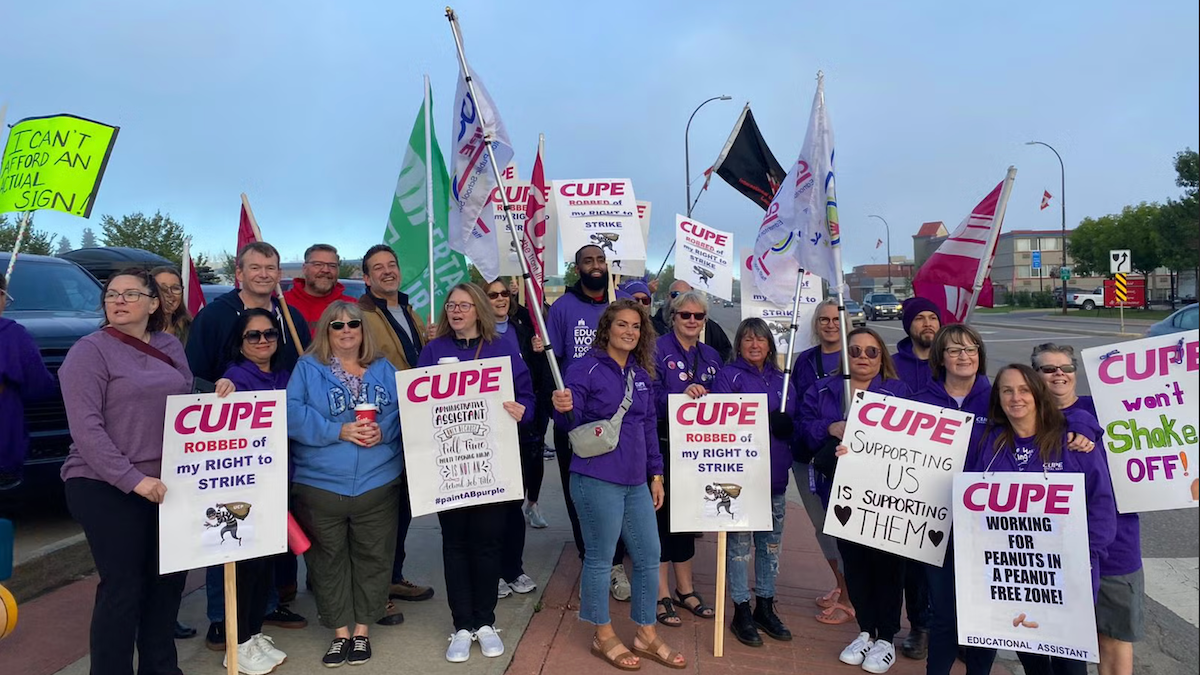 CUPE school board workers, prevented from striking by the Alberta government, protest in Fort McMurray on September 17.