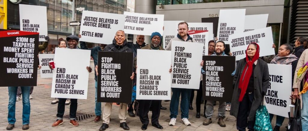 Members and supporters of the Black Class Action Secretariat rallying outside of court this week.