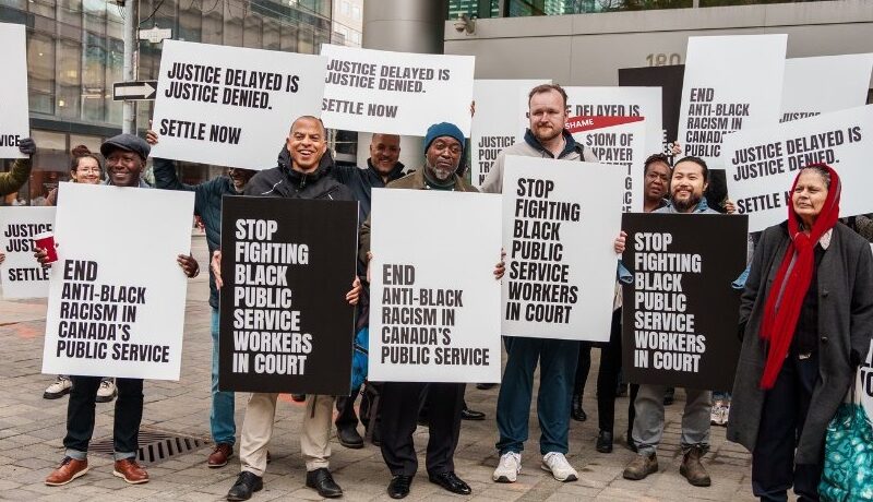 Members and supporters of the Black Class Action Secretariat rallying outside of court this week.