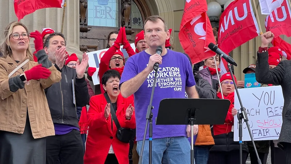 CUPE Alberta President Rory Gill addresses public sector union members from the steps of the Alberta Legislature.