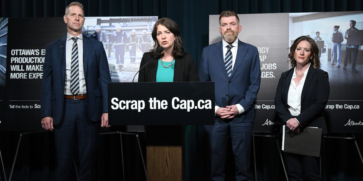 The four Horsemen of the UCP Apocalypse, from left to right, Utilities Minister Nathan Neudorf, Premier Danielle Smith, Energy Minister Brian Jean, and Environment Minister Rebecca Schulz, announce the $7-million “Scrap the Cap” campaign.