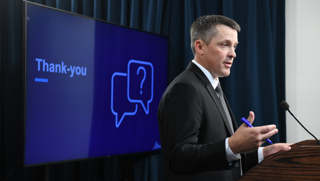 Alberta Finance Minister Nate Horner, taking questions at a press conference.