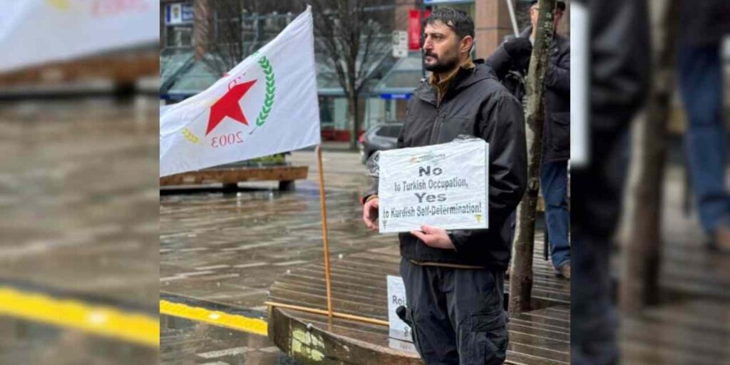 A protester at a rally in support of the Kurdish community in December of 2024 in Vancouver.