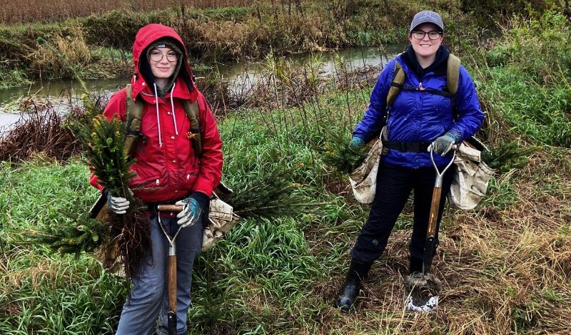 Volunteers with the Raisin Region Conservation Authority planting trees.