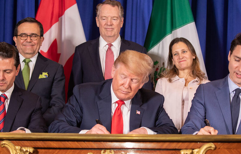 Canada, US, and Mexico signing the CUSMA in 2018.