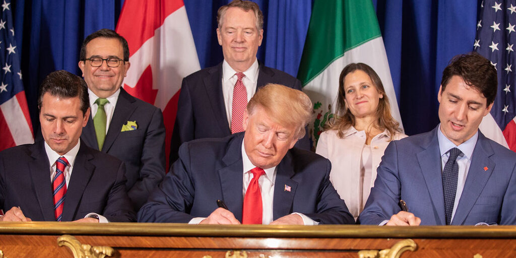 Canada, US, and Mexico signing the CUSMA in 2018.