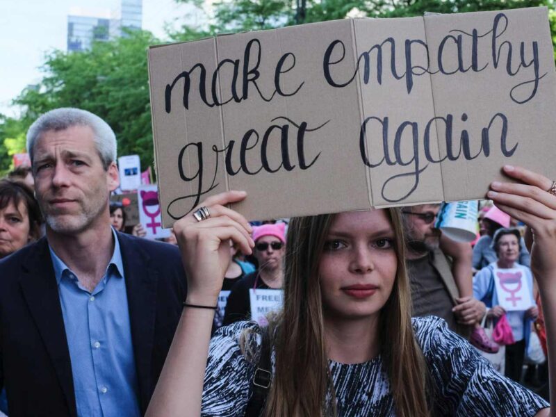 A sign advocating for empathy.