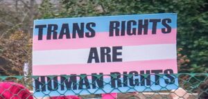 A trans rights sign.