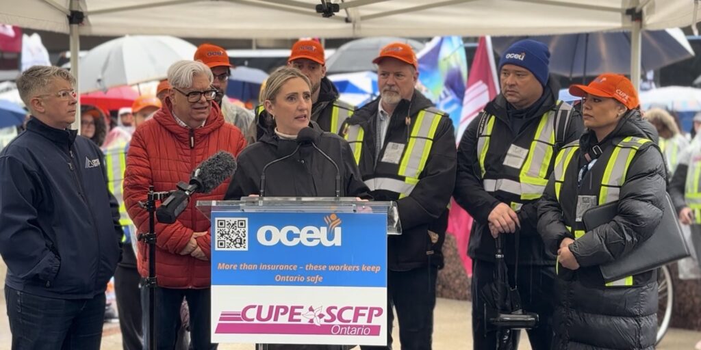 Ontario Federation of Labour president Laura Walton along with other Ontario labour leaders at an OCEU event on Thursday, May 22.