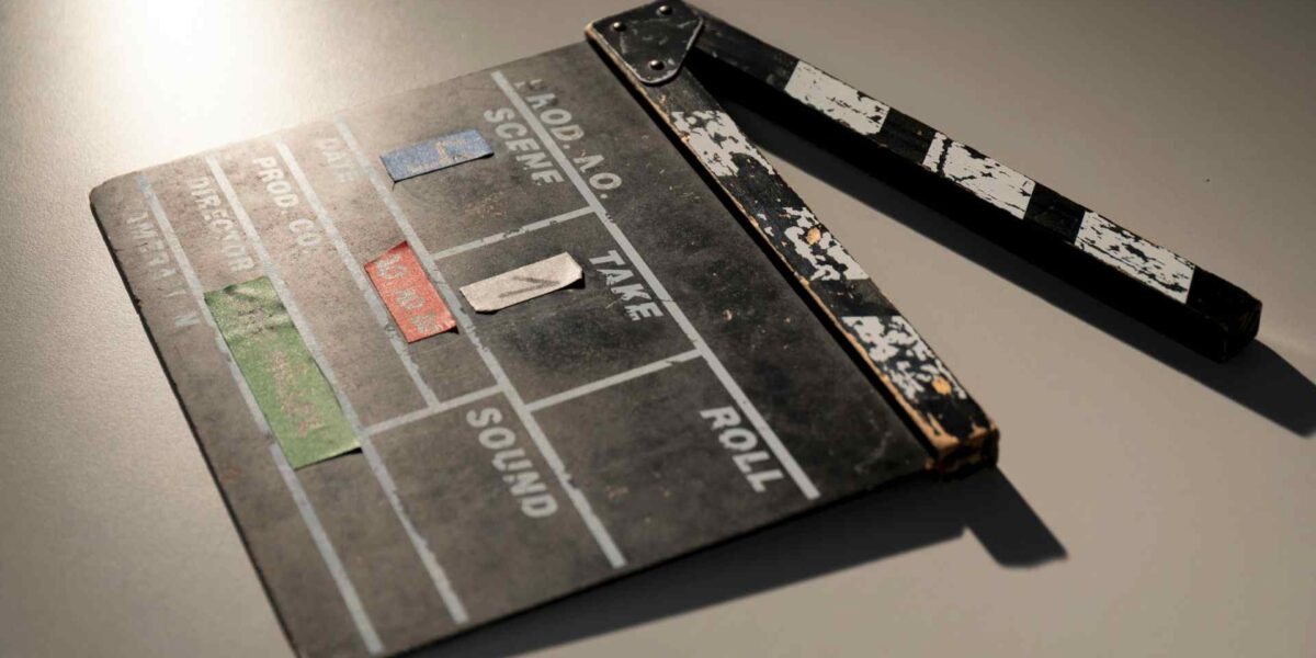 A clapperboard that would be used on the set of a production.