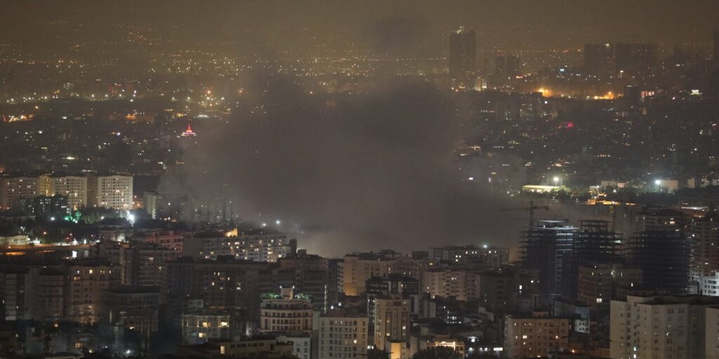 Smoke rises from downtown Tehran after an Israeli missile strike.