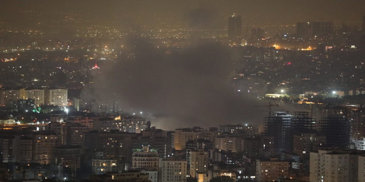 Smoke rises from downtown Tehran after an Israeli missile strike.