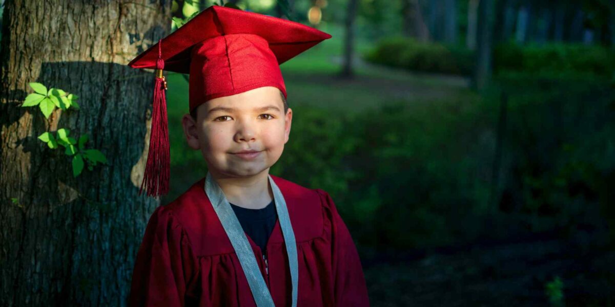 A kid who just graduated kindergarten.