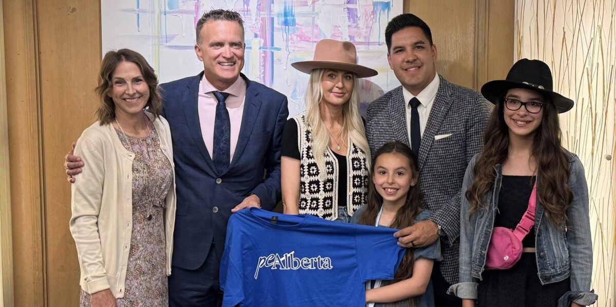 Peter Guthrie and Scott Sinclair with their families.
