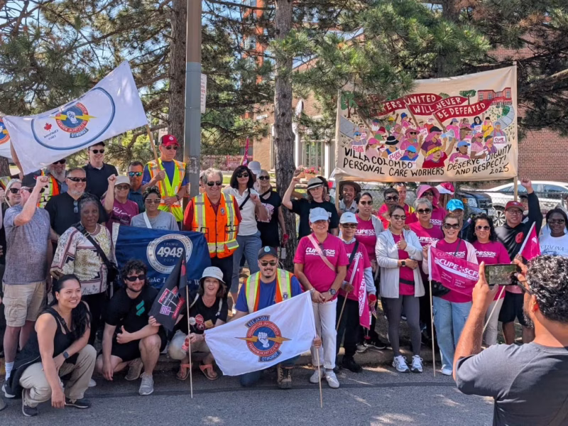 An image of striking Villa Colombo workers and their allies on the picket line outside their workplace.