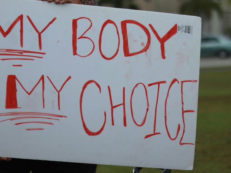 An image of a protest sign that says, "My body, my choice." The Abortion Rights Coalition of Canada is asking their donors to submit a video sharing why they support the ARCC.