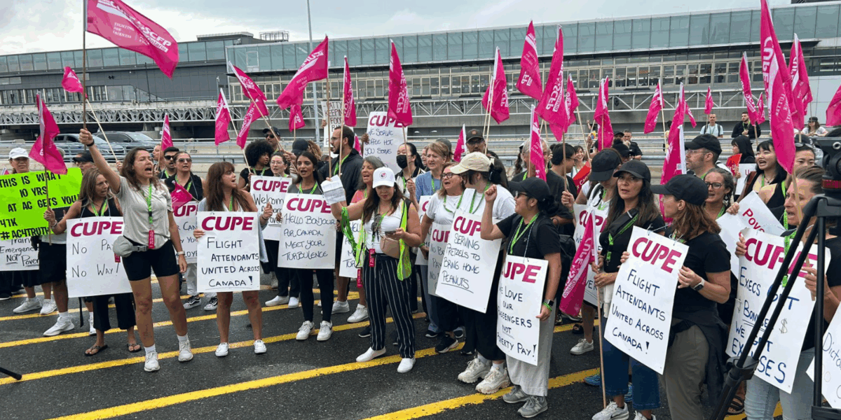 Flight attendants rally outside of Pearson International Airport in Toronto on Sunday, August 17.