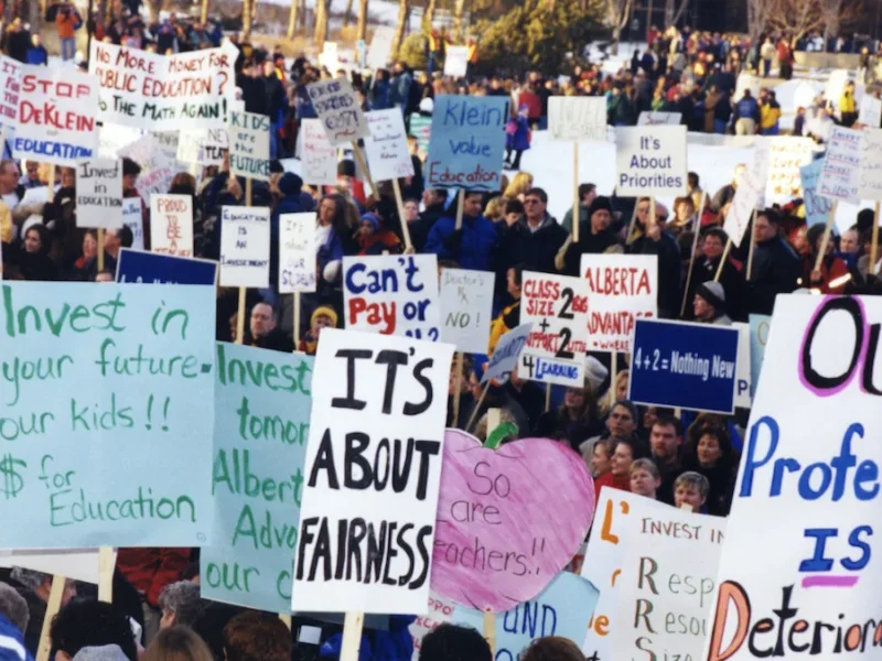 Striking teachers gather to protest at the Alberta Legislature Building in Edmonton in 2002.