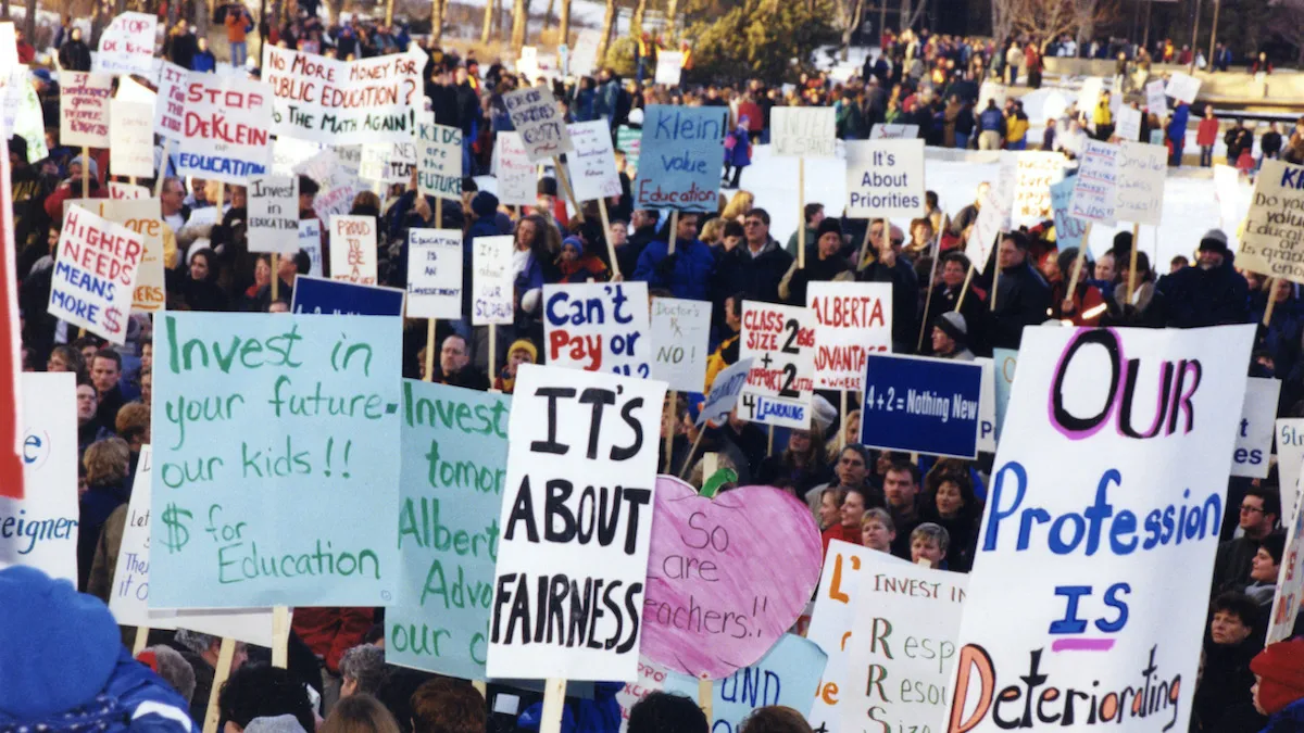 Striking teachers gather to protest at the Alberta Legislature Building in Edmonton in 2002.