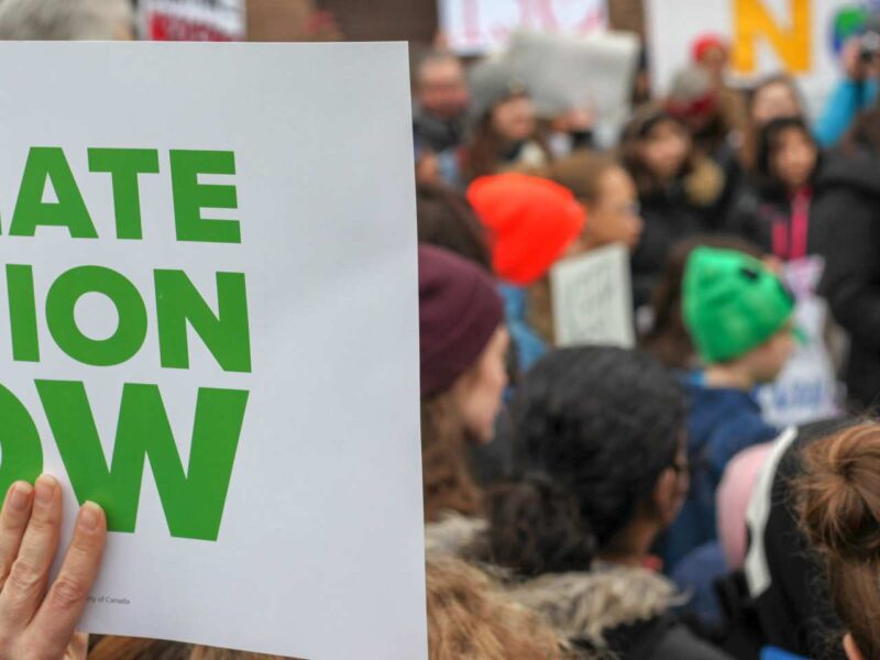 A protest sign calling for climate action.