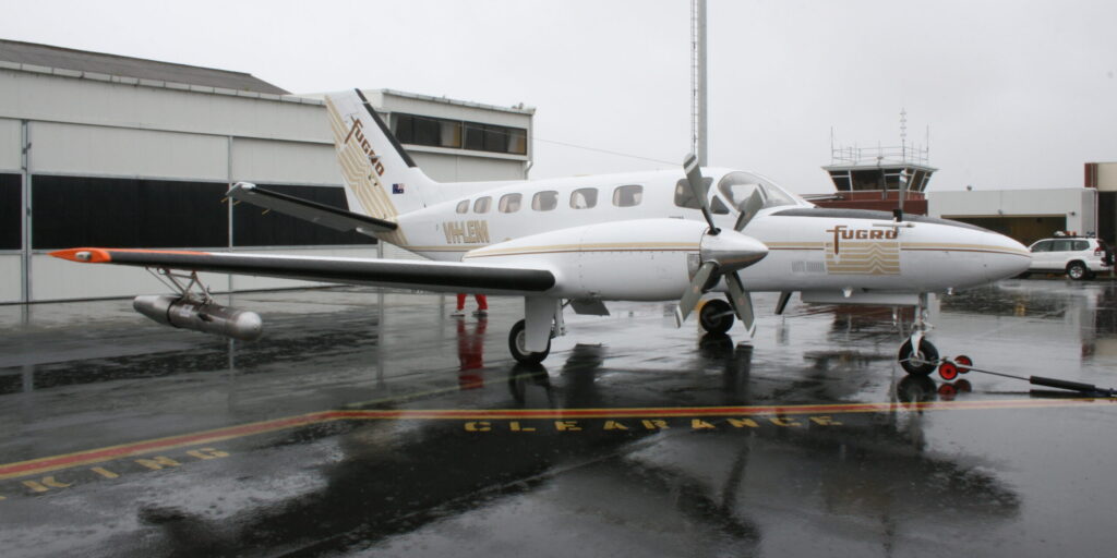 A Cessna 441 Conquest II (VH-LEM) fitted with cloud seeding equipment.