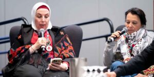 Pictured from left-to-right are Lana Nazzal, president of the Palestinian Governmental Health Service Employees' Union and Carine Metz, coordinator with the Democracy and Workers' Rights Centre in Palestine.