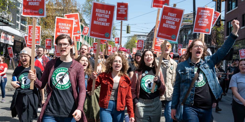 Starbucks workers rally and march in Seattle, WA in 2022.