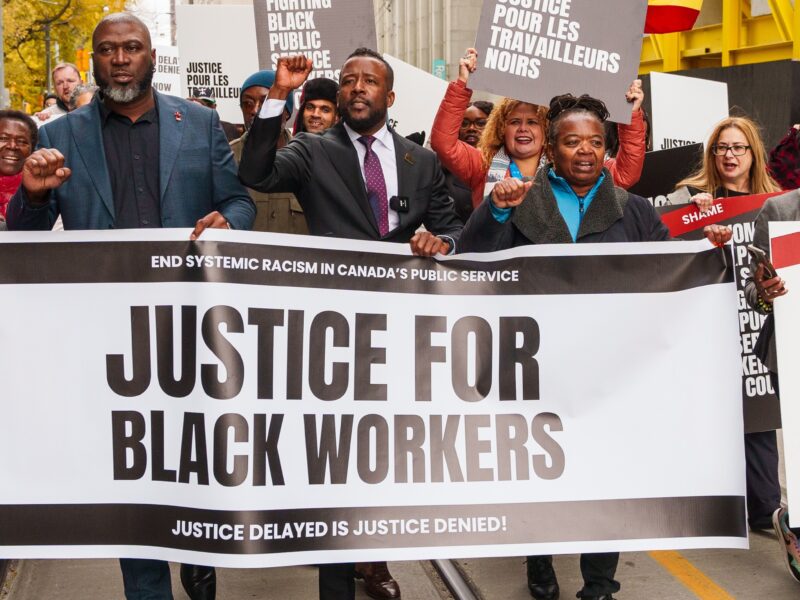 Nicholas Marcus Thompson, president of the Black Class Action Secretariat, pictured here at the 2025 Emancipation Day parade, continues to fight for employment equity for Black workers in the public service.