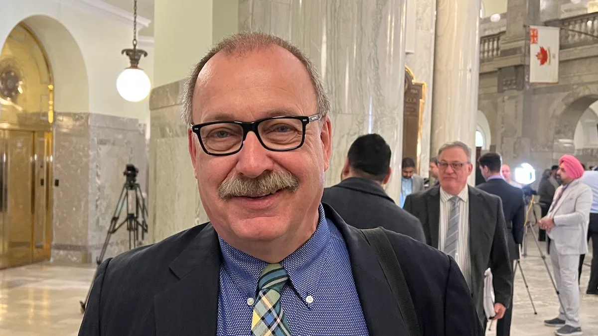 Ric McIver at the Alberta Legislature in February 2023, when he was minister of municipal affairs, wearing an Alberta tartan necktie.