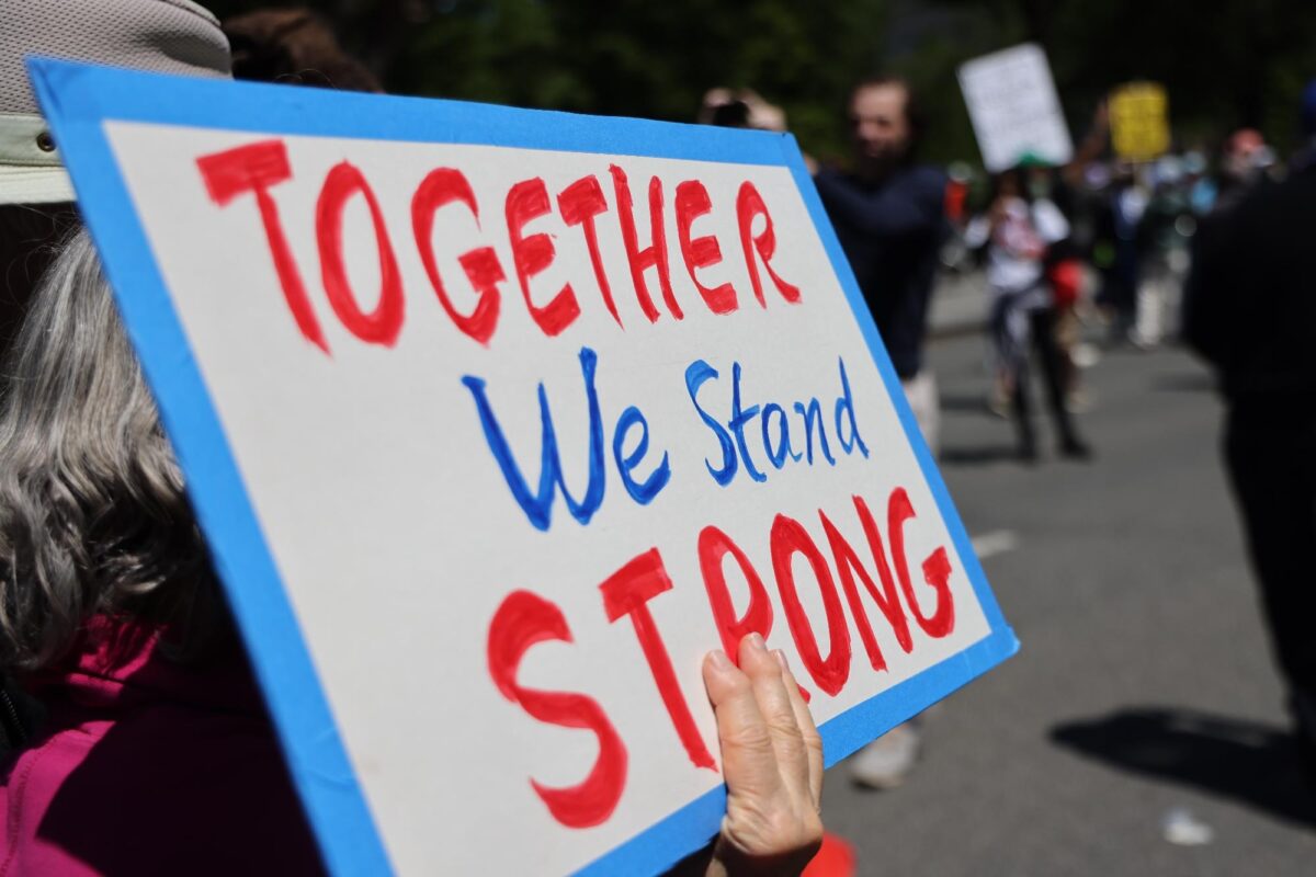 A protest sign at the AFL-CIO May Day 2026 rally in Washington, DC.