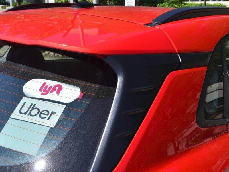 A car with an Uber logo.
