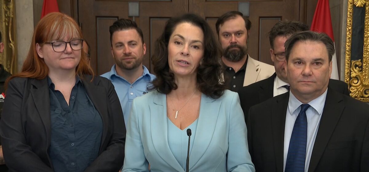 Heather McPherson holding a press conference to discuss her anti-employer-influenced union bill on June 4, 2026.