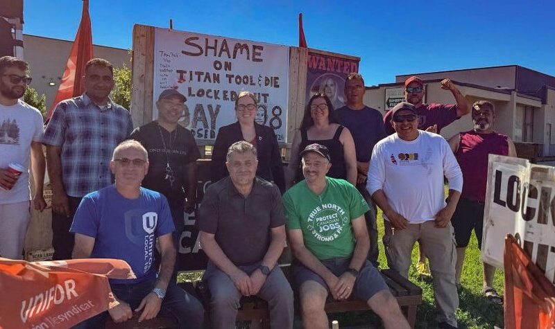 An image of the members of the picket line who have been locked out by Titan Tool & Die for eleven months.