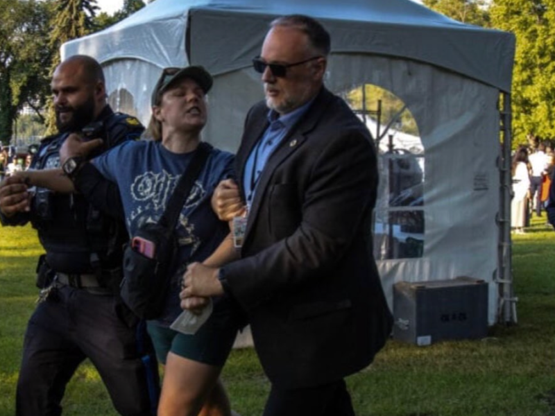 In a memetic moment captured on video, Danielle Smith’s security frog-marches an articulate protester away from the “Premier’s K-Days Breakfast” last Thursday.